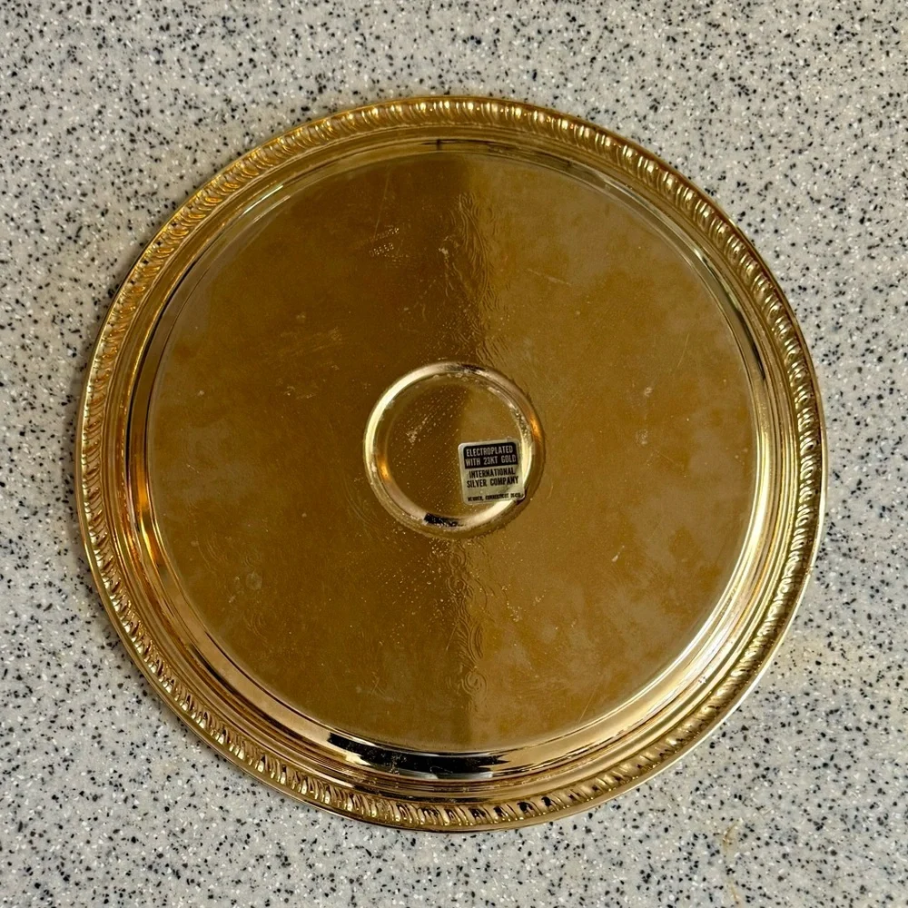 Vtg.Wm Rogers 23k gold plated ornate floral etched tray.12” diameter.